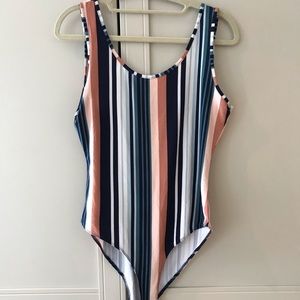 Striped body suit never worn